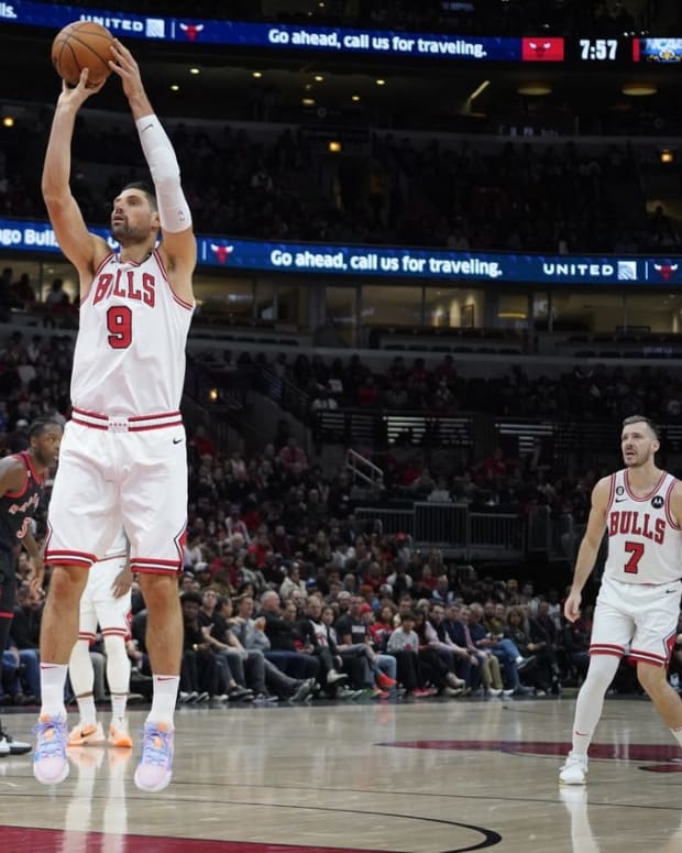 Nov 7, 2022; Chicago, Illinois, USA; Chicago Bulls center Nikola Vucevic (9) shoots over Toronto Raptors forward Christian Koloko (35) during the first half at United Center. Mandatory Credit: David Banks-USA TODAY Sports